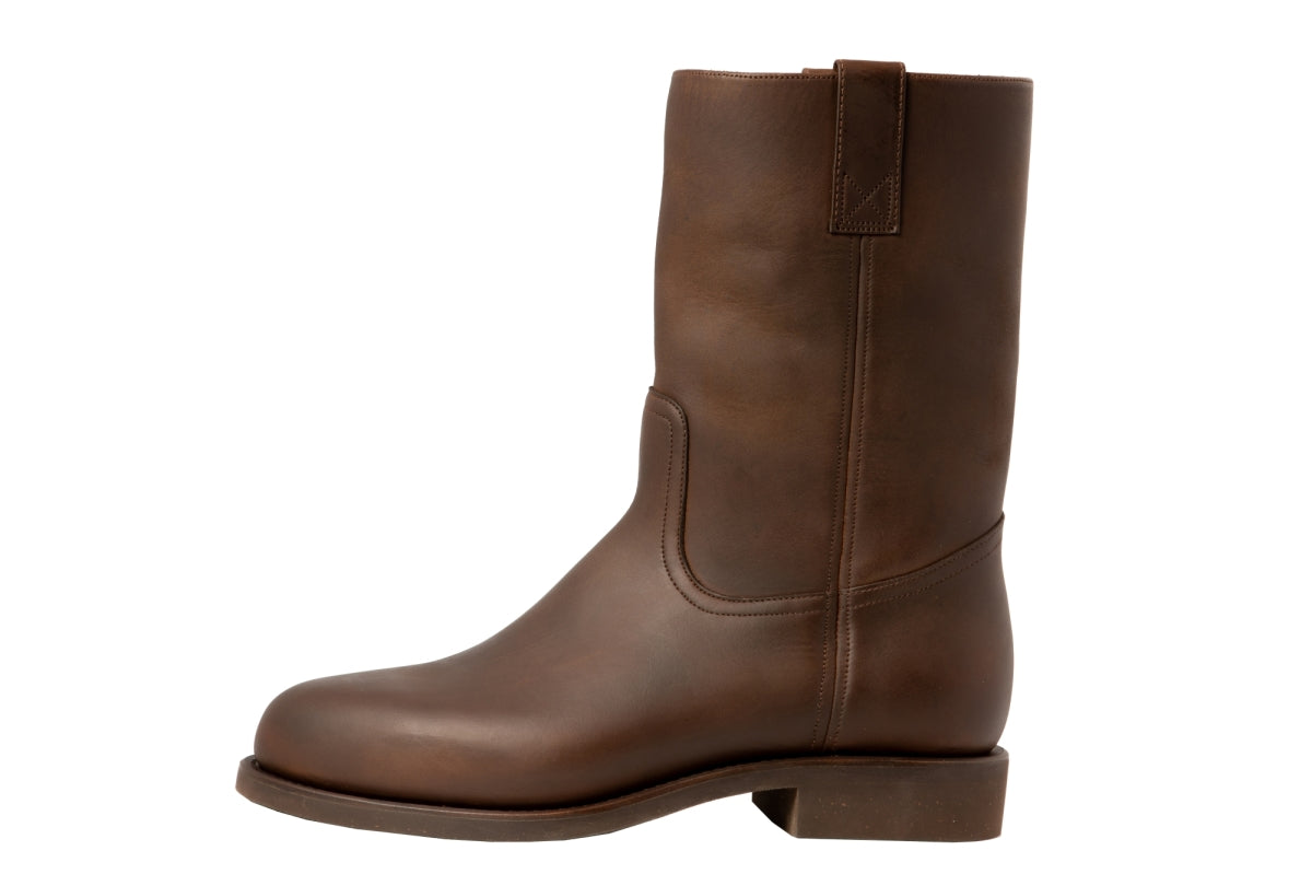 Heavy duty roper work boot made from Australian bull hide leather with leather lining, Poron comfort footbed, and thick oil-resistant cork rubber sole and heel.